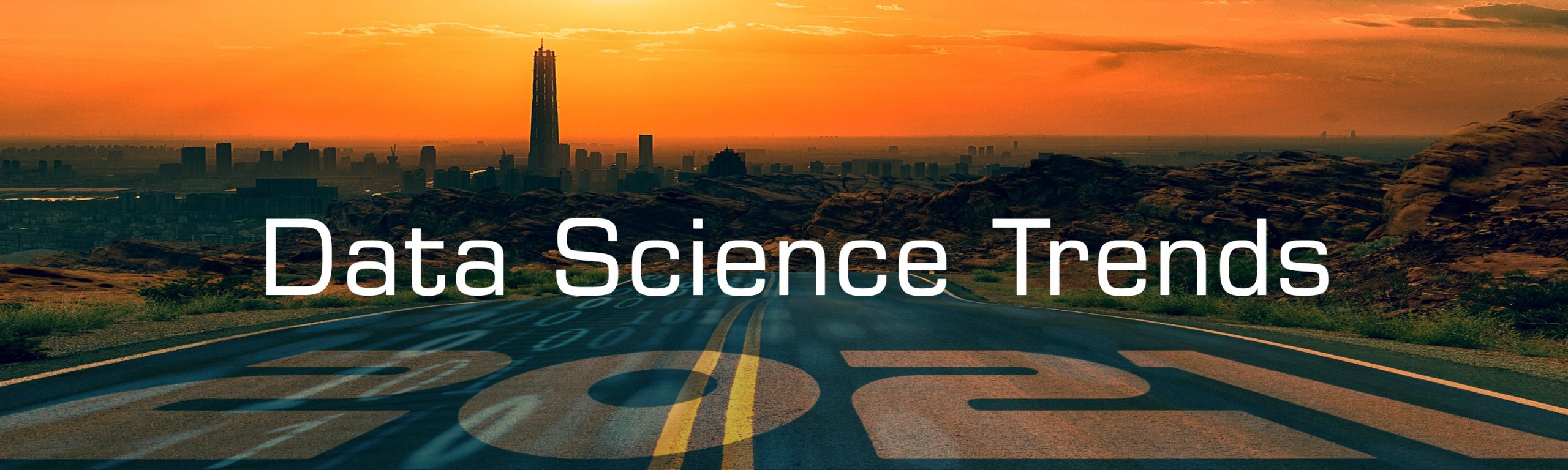 Schriftzug Data Science Trends über einer Straße mit Sonnenuntergang